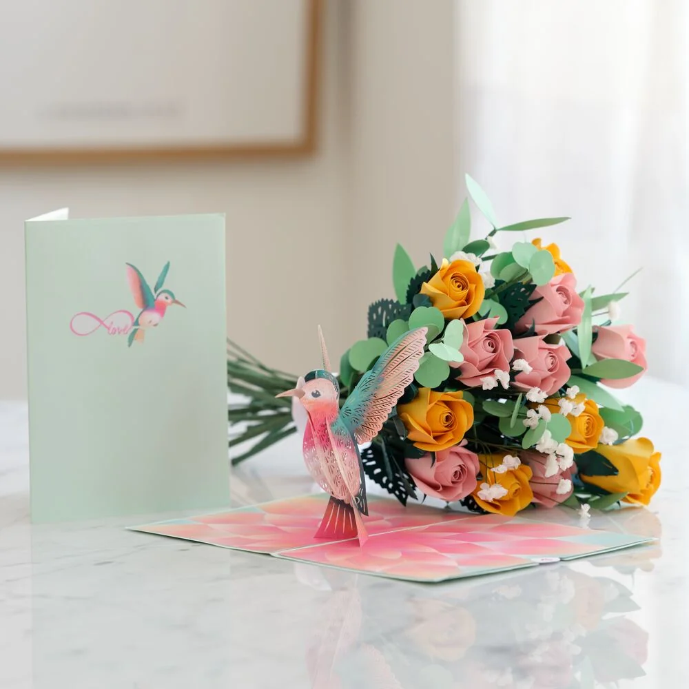 Lovepop Handcrafted Paper Flowers: Pink & Yellow Roses (12 Stems) with Lovely Hummingbird Pop-Up Card Vase
